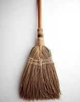 Top of view one broom stick on the white background photo
