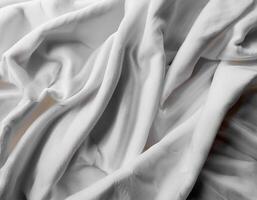 Background concept. Blankets that are still wrinkled have been used. The white blanket is crumpled and shabby. Pattern texture background photo