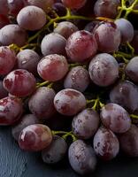 a pile of close-up grapes fruit fresh, organic. photo