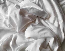 Background concept. Soft bed sheets that are still wrinkled after being used. The white bed sheets were crumpled and shabby. Pattern texture background. photo