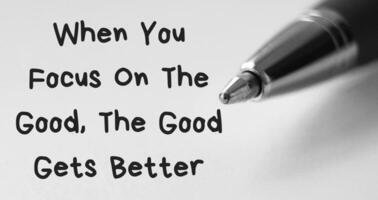 When you focus on the good, the good gets better text on black and white background. photo