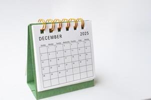 December 2025 table calendar on white background with customizable space for text photo
