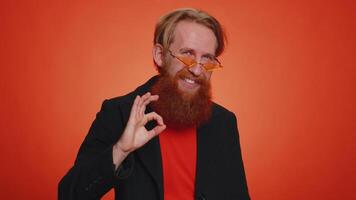 Man looking approvingly, showing ok approve feedback gesture like sign positive something good video