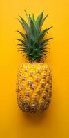Pineapple on Yellow Background photo
