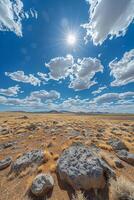 Boulders Under Clear Blue Sky in Desert photo