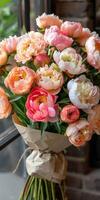 A Bunch of Peonies Sitting on a Table photo
