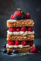 Stack of Cake Topped With Berries and Whipped Cream photo