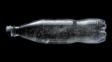 Plastic Bottle With Water Droplets on Black Background photo