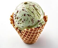 Scoop of Pistachio Ice Cream in Waffle Cone photo