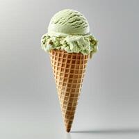 Green Ice Cream Cone With Pistachio Scoop photo