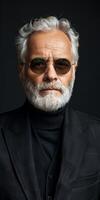 Older Man in Sunglasses and Black Suit photo