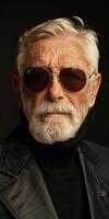 Older Man in Sunglasses and Black Jacket photo