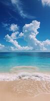 Sandy Beach With Blue Water and Clouds photo