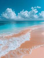 Sandy Beach With Clear Blue Water and White Clouds photo