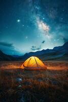 Tent in Field Under Night Sky photo