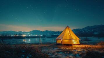 Tent Set Up in Snow at Night photo
