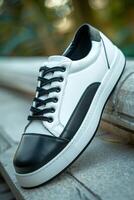 White and Black Sneaker With Black Laces photo