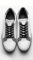 Pair of White and Grey Shoes on White Surface photo