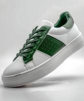 White and Green Sneaker on White Background photo