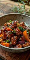 Bowl of Chicken Stir-Fry on Wooden Table photo