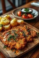 Wooden Cutting Board With Meat and Potatoes photo
