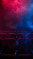 Eerie theater scene with red and blue smoke photo
