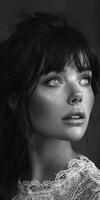 Elegant woman with bangs in black and white photo