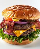 Cheeseburger with bacon, lettuce, and tomato photo
