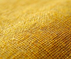 Close up view of yellow fabric photo