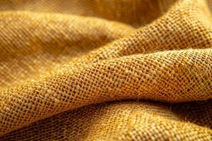 Close up view of yellow fabric photo
