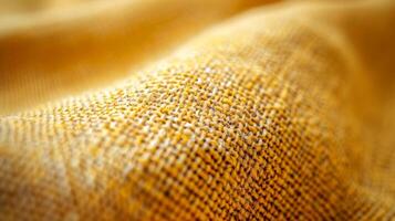 Close up view of yellow fabric photo