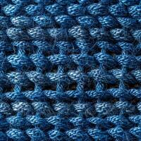 Close-up of blue knitted material photo