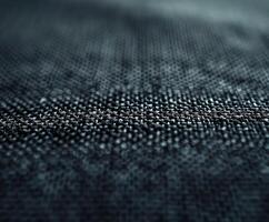 Black and white cloth draped over wood table photo