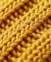 Close up of a yellow knitted blanket photo