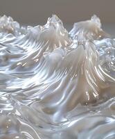A close up of a wave of water photo