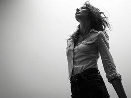 Woman with hair blowing in the wind photo