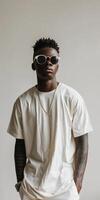Man in white shirt and sunglasses photo
