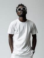 Man wearing white shorts and white t-shirt photo