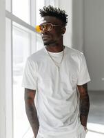 Man in white shirt and sunglasses photo