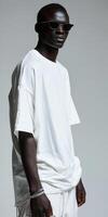 Man in white shirt and white shorts photo