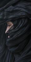 Close up of person with black hair photo