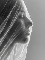 Mannequins head wrapped in plastic photo