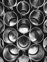 Metal cups stacked in a pile photo