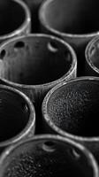Array of pots in black and white photo