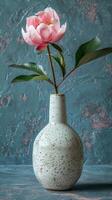 White vase with pink flower photo