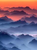 Majestic mountain range with sunset photo