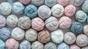 Assorted yarn balls arranged neatly photo