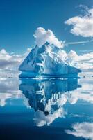Massive iceberg drifting in open ocean photo