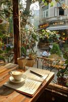 Cup of coffee on wooden table photo