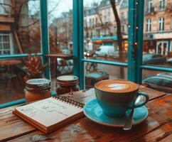 A cup of coffee on wooden table photo